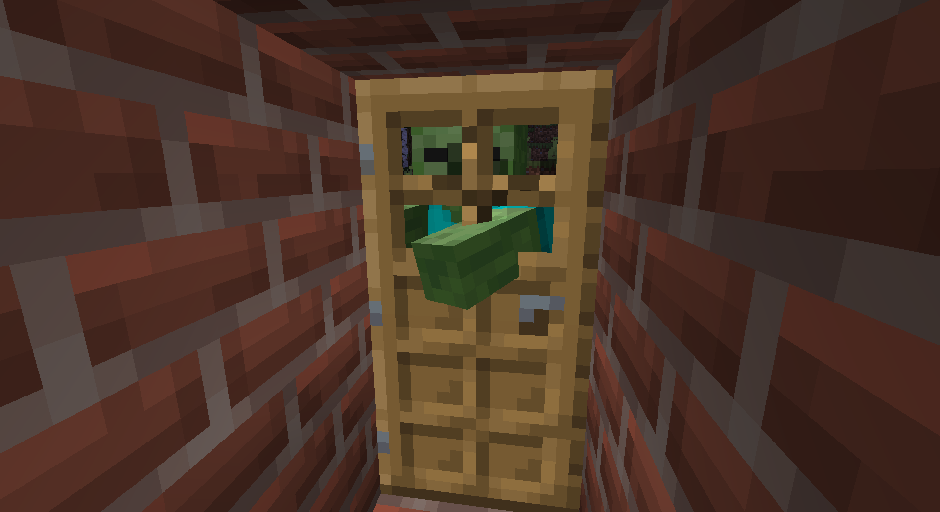 A Zombie Breaking Down a Door in Minecraft