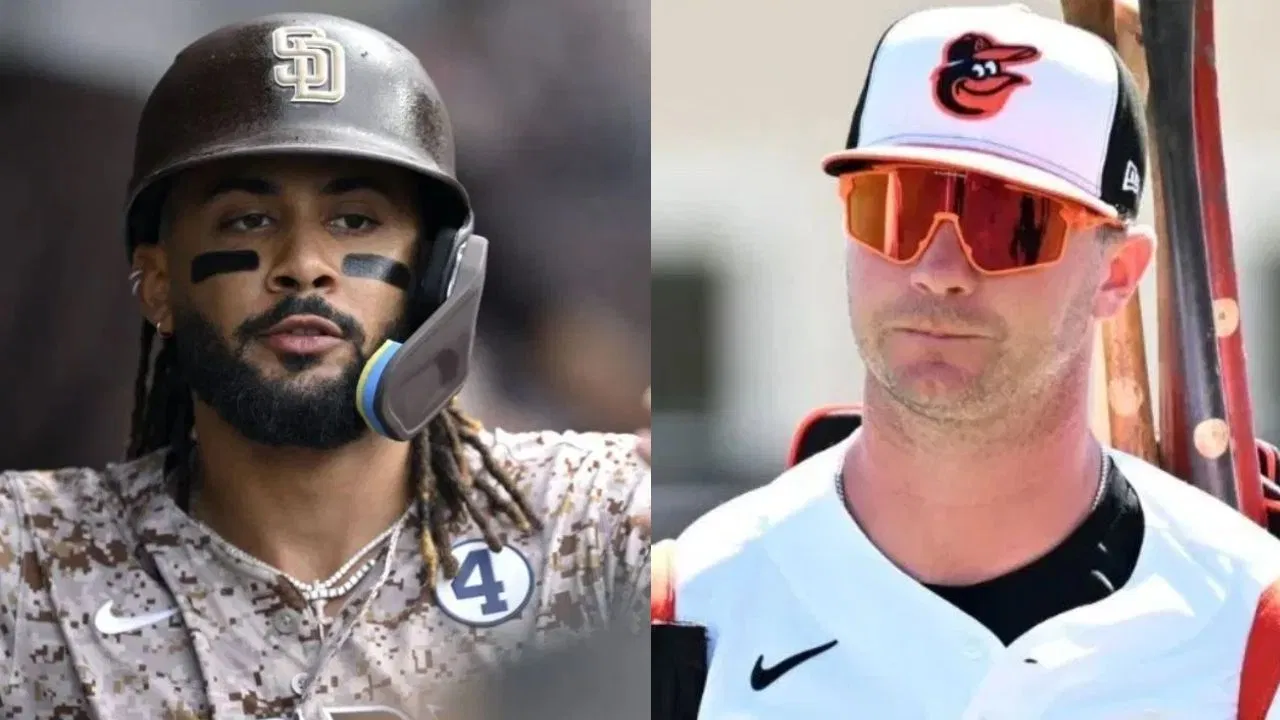 Player fighting the Ender Dragon in the End dimension with purple crystals above obsidian pillars