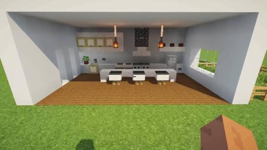 Minecraft world showing diverse village structures with varied roof designs and layouts