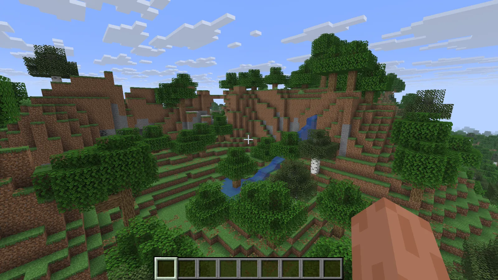 A vibrant Minecraft plot build showing modern structures using white, gray, and cyan concrete stairs, slabs, and walls i...
